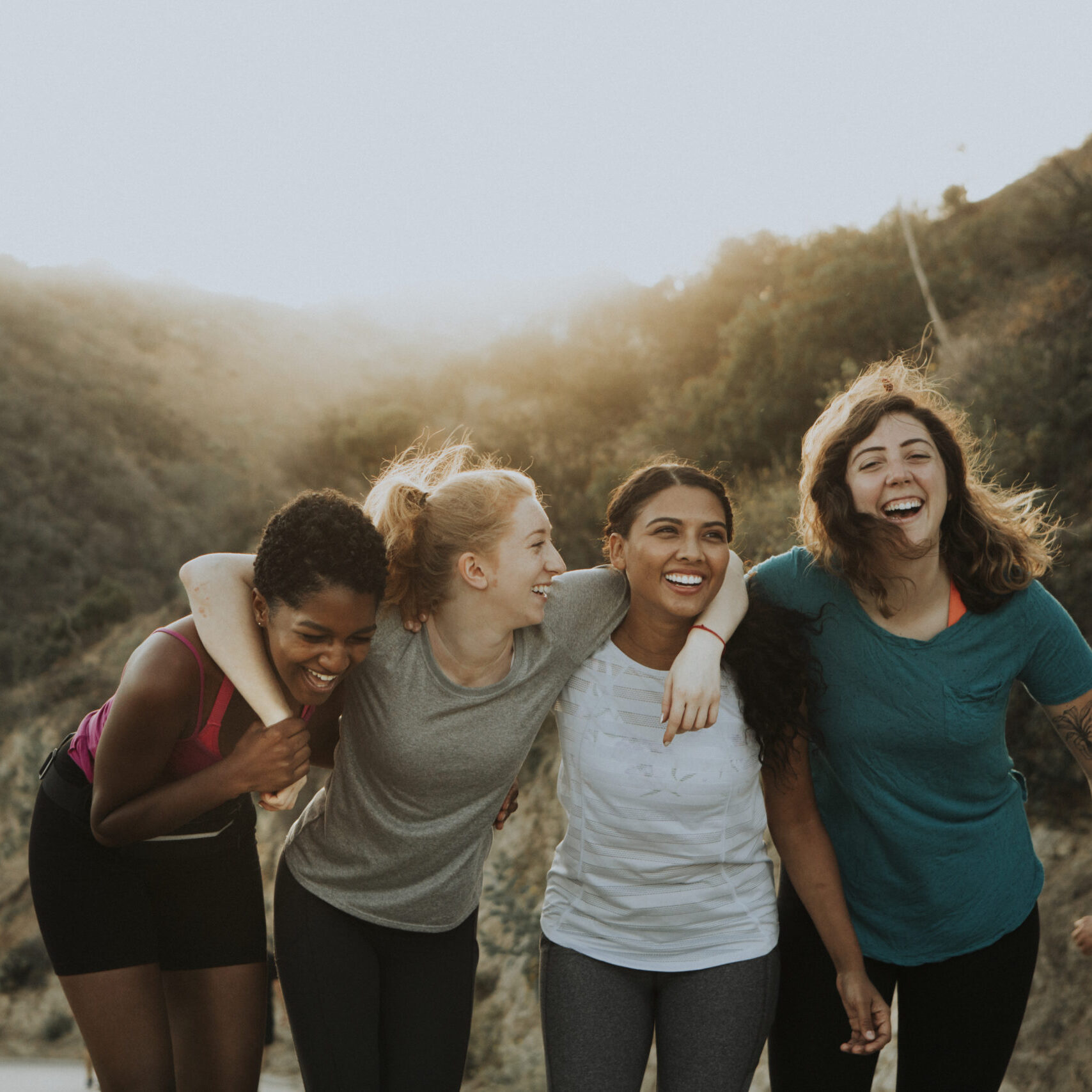 group of happy women supporting each other.